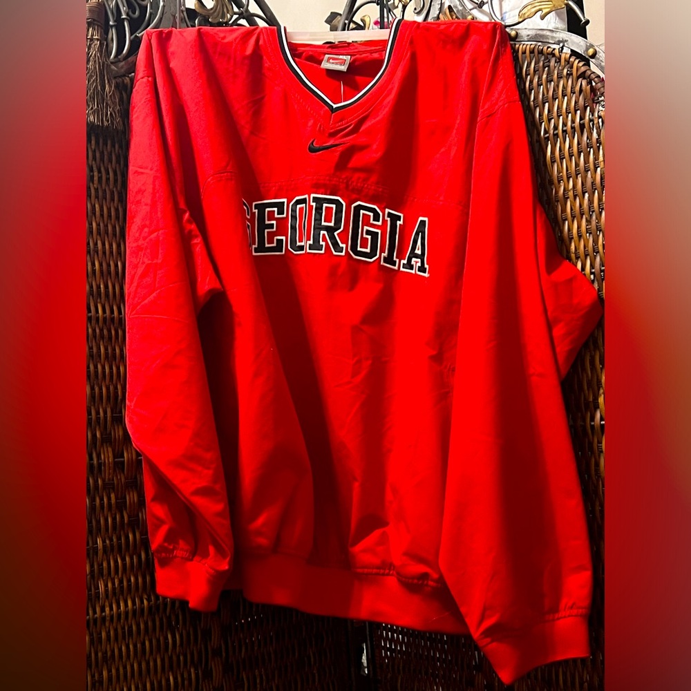 Red pull over jacket new with tags.